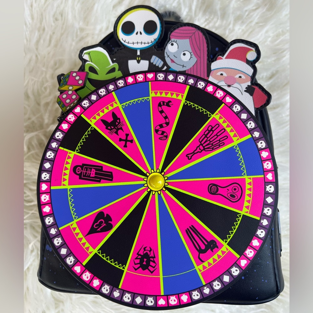 Brand new Disney NBC Oogie Boogie Wheel mini backpack.